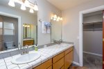 Master bathroom with double vanity and walk in shower 